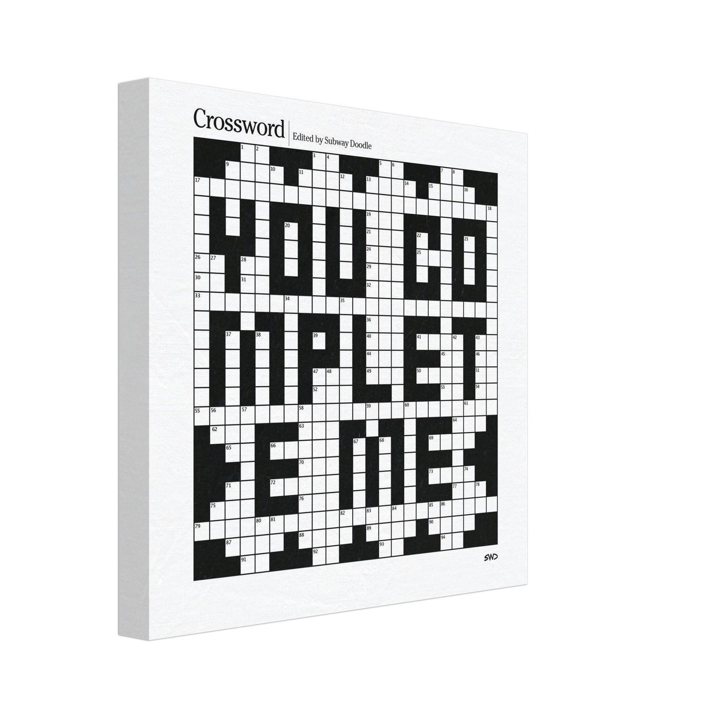A three-quarter view of a white canvas with a crossword themed graphic that reads YOU COMPLETE ME.